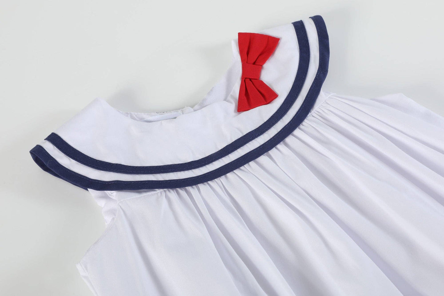 White and Navy Swing Dress with Bow